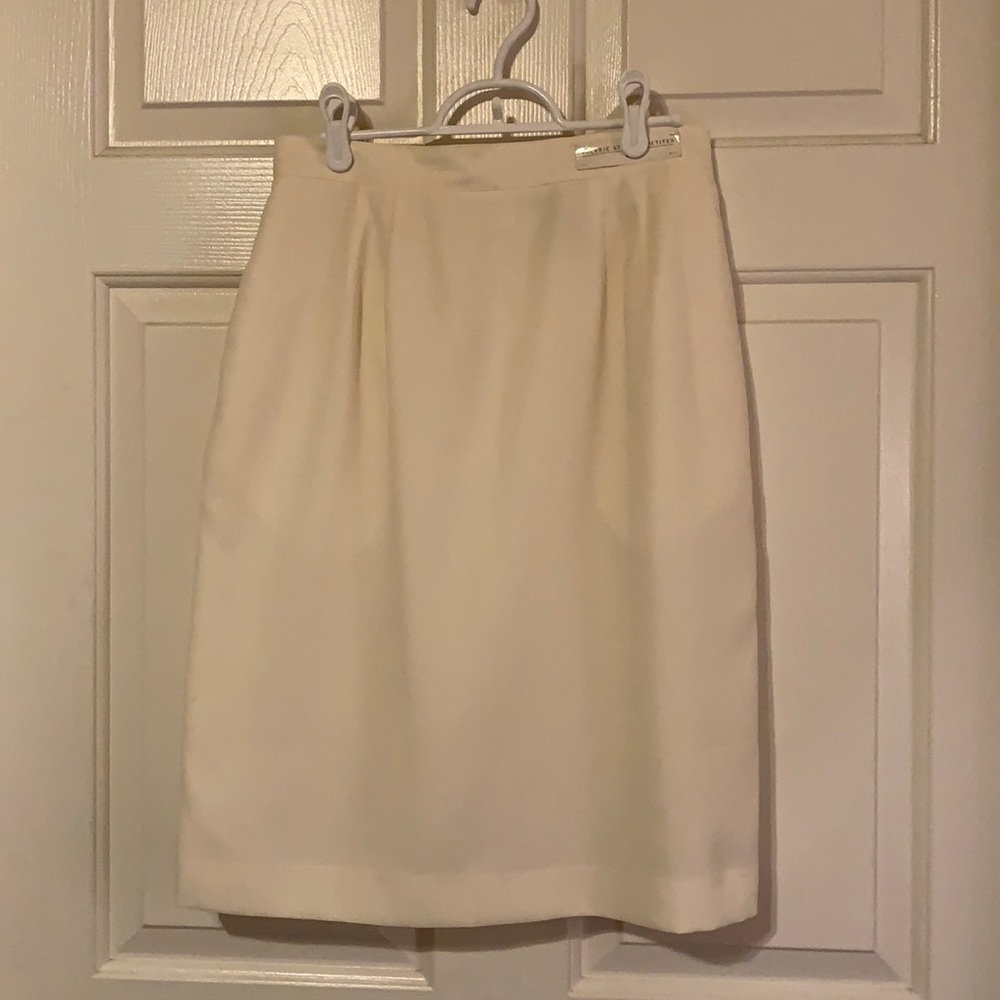 Cream colored pencil skirt. Fully lined.